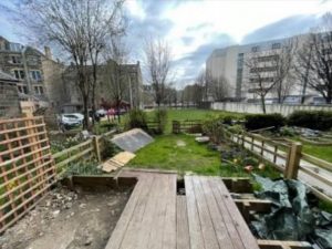 Back garden of the Leith property with decking and lawn, on the site of the former dry dock